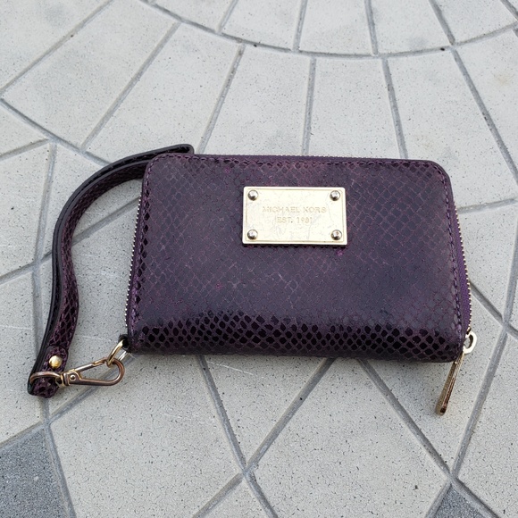 Michael Kors Handbags - **SOLD** Michael Kors Python Leather Wristlet